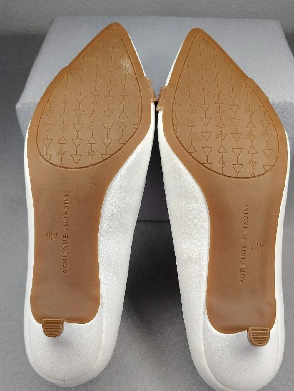 Adrienne Vittadini White Kitten Heels Rose Gold Accents Holding Gold Chain